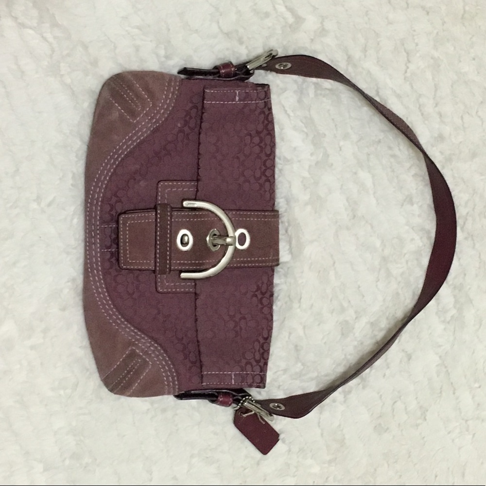 Coach flap purse with buckle closure detail
